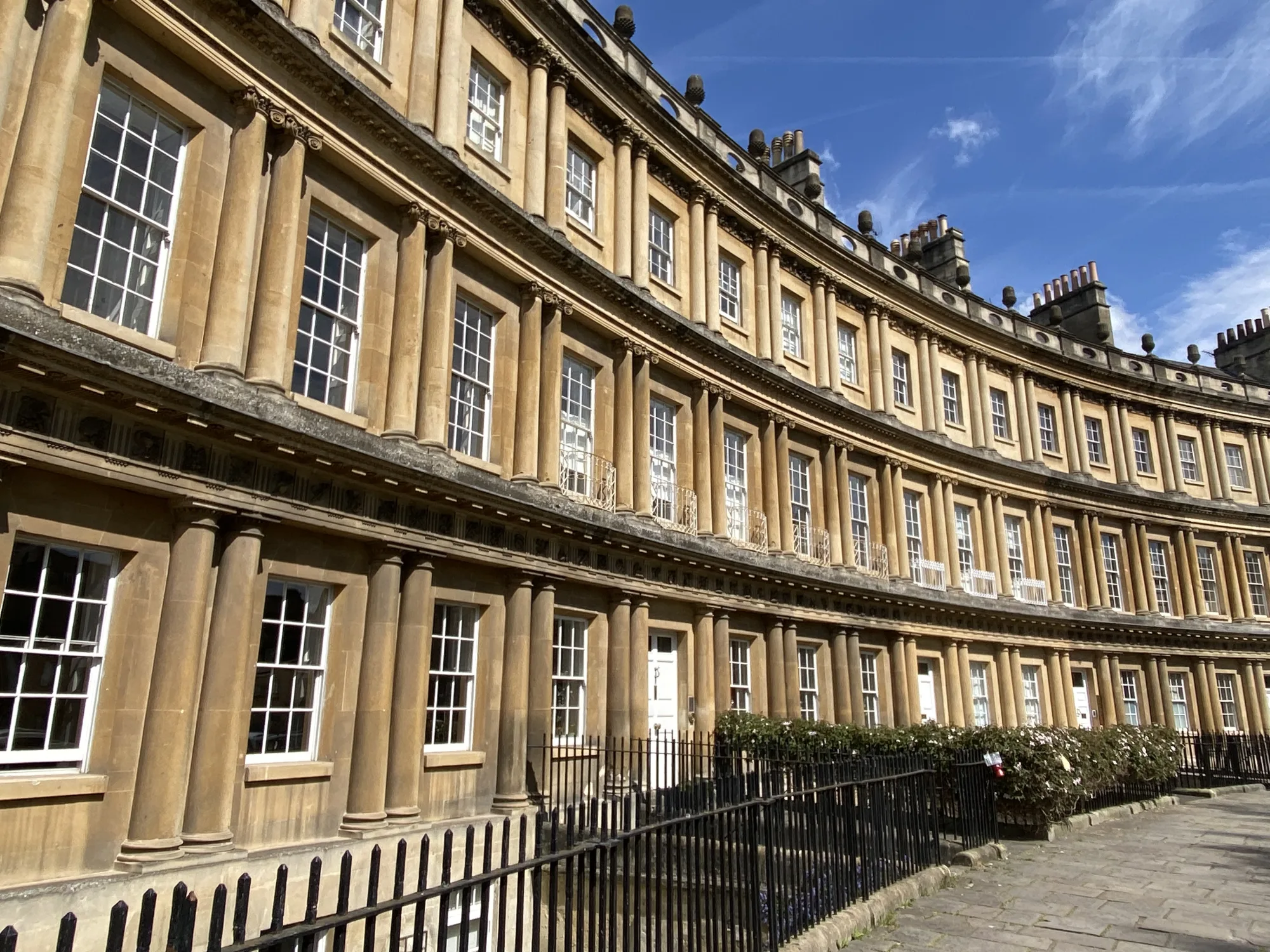 The Circus in Bath, a curve of Georgian townhouses in honey limestone with columned facades