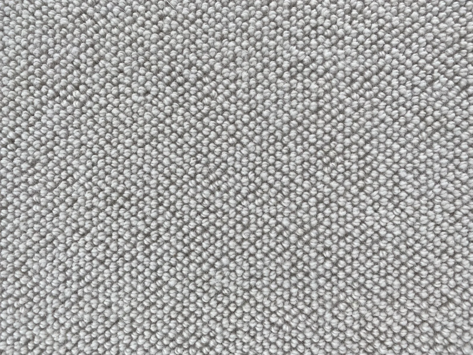 A grey woven upholstery fabric