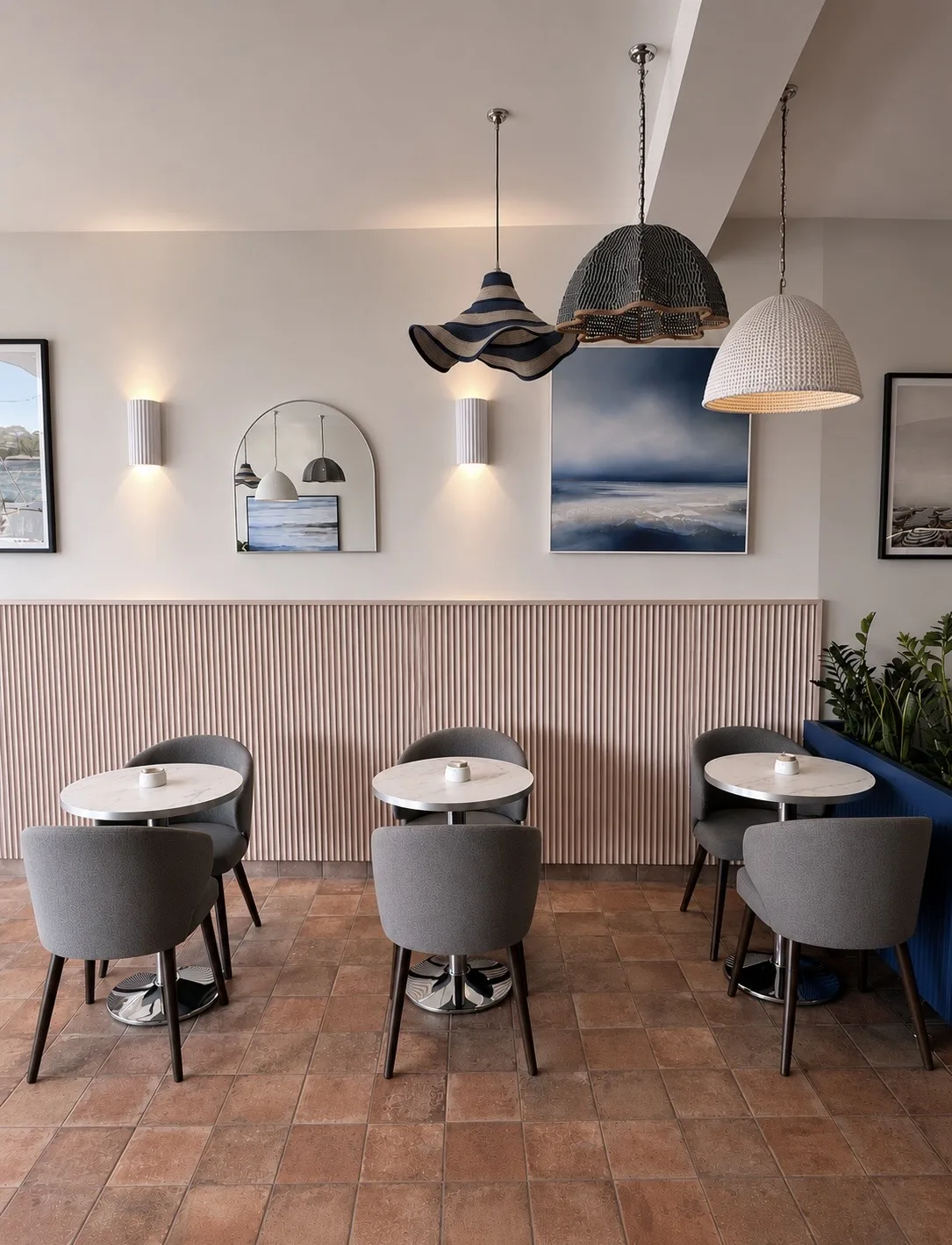 Cafe seating below fluted oak panelling with pendant lighting above, Amalfi Bar & Cafe, Bideford, Devon