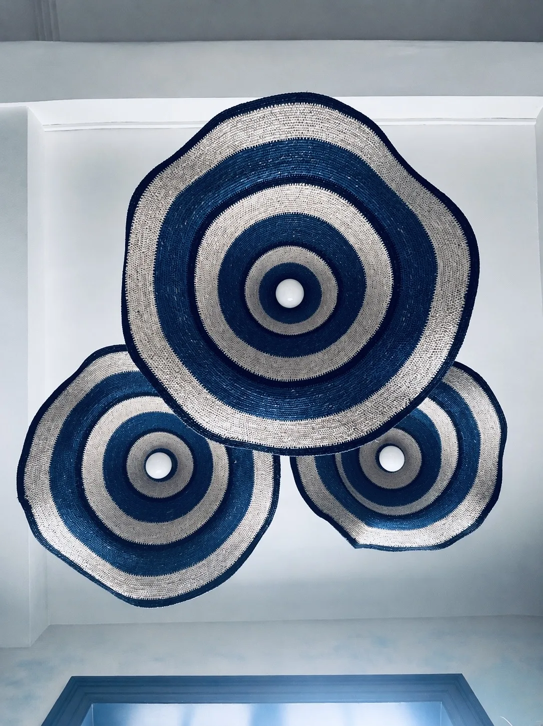 Blue and white striped seagrass pendants above the cafe seating, Amalfi Bar & Cafe, Bideford, Devon