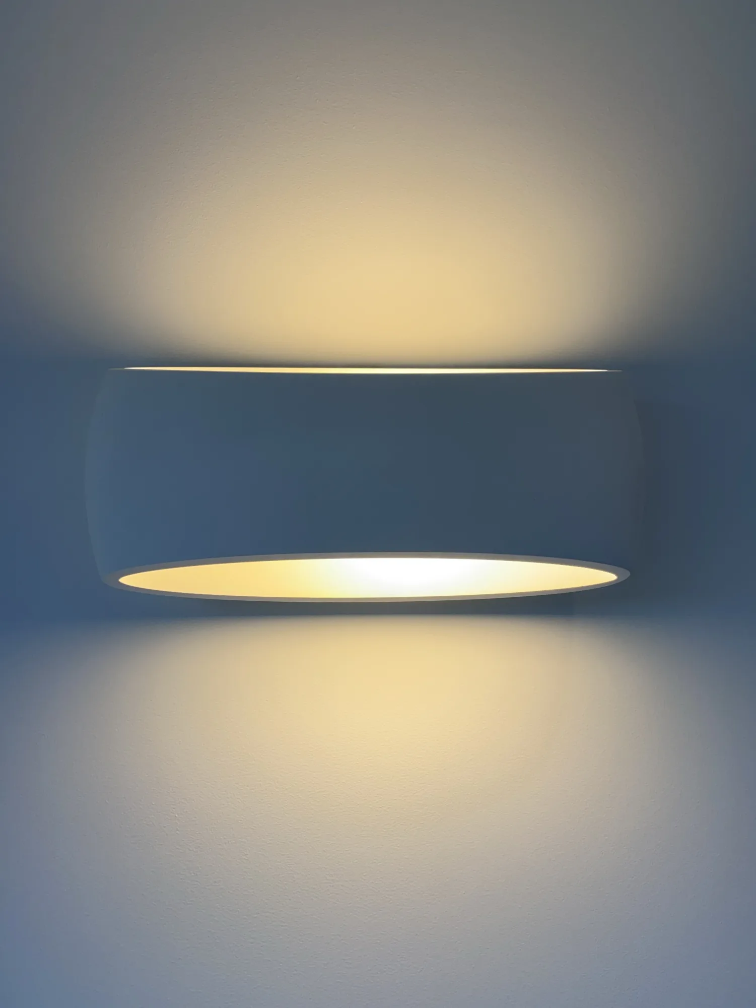 Astro Ceramic Aria wall light in white, washing light across the wall, Northam, Devon