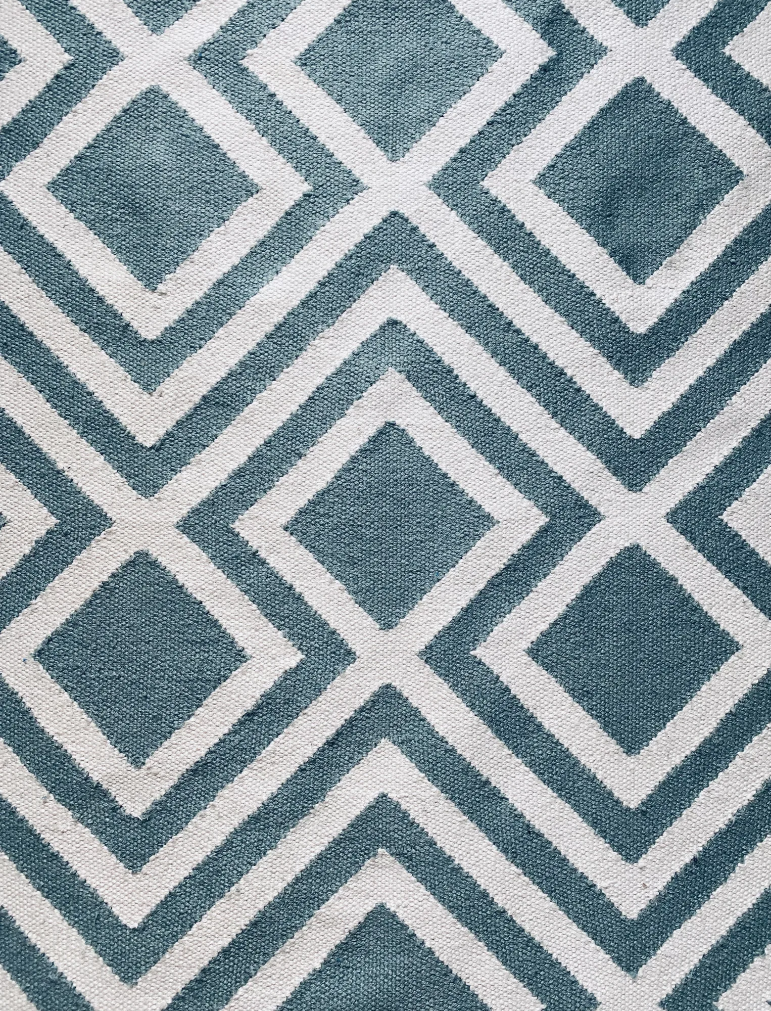 Weaver Green geometric rug in teal, Stevenstone, Devon