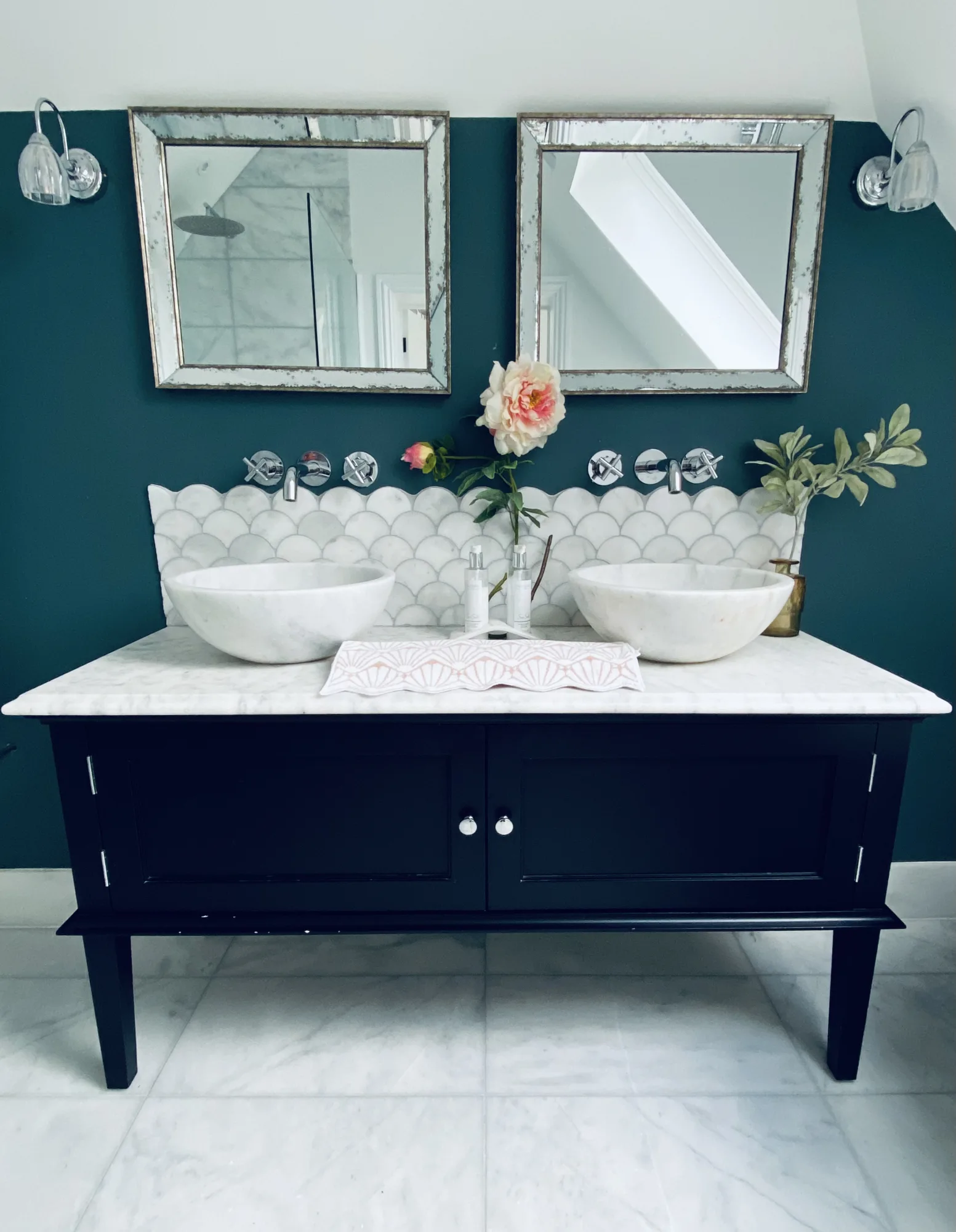 Master ensuite with a black twin vanity unit, marble basins and scallop mosaic tiling, Topsham, Devon
